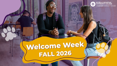 2 students talking in the hallway.