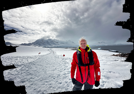 Professor Eric Eckert standing on Antarctica with a snowy background
