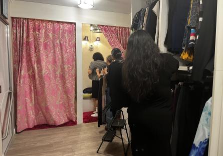 An EMCC student gets styled in professional clothing