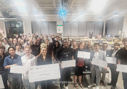 Group photo of winners and audience