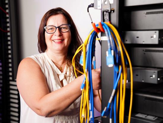 Woman working on a network system