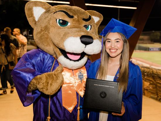 Roary and student at graduation