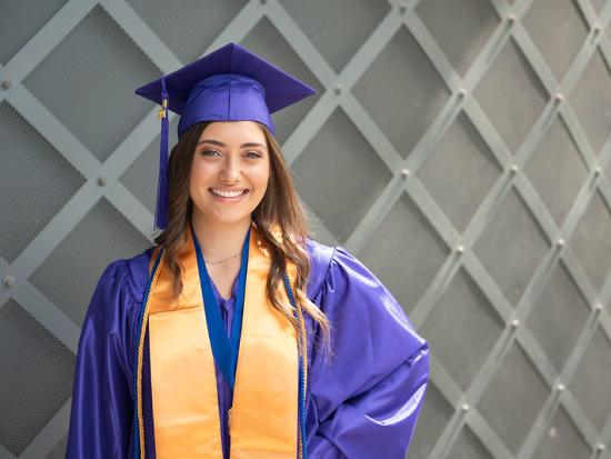 student in a graduation gown and cap