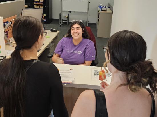 student being helped by staff
