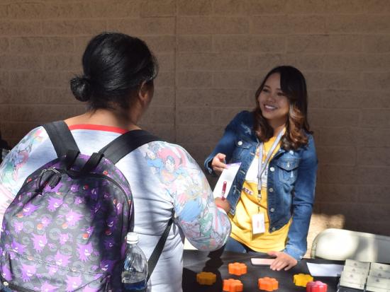 student being helped by staff